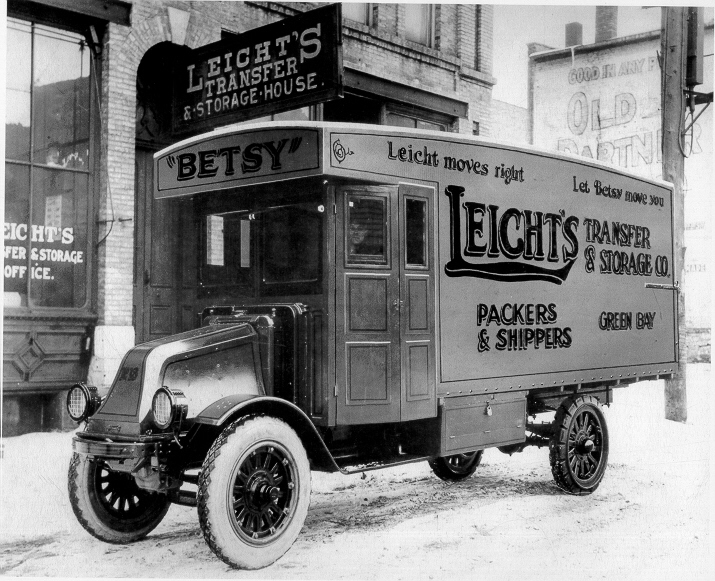 Leicht Transfer & Storage original truck, Betsy, driving through Downtown Green Bay