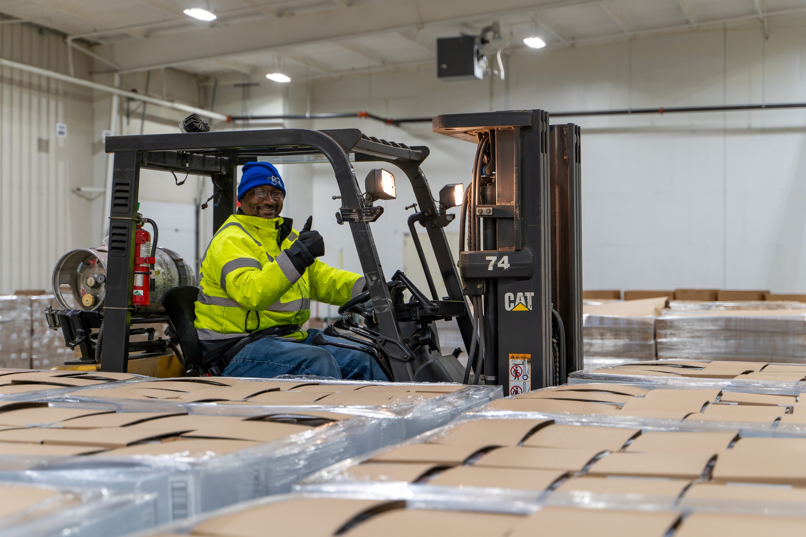 Picture of RGL an RGL teammate who is doing the Job of Forklift Operator at one of RGL's warehouses in the Green Bay and Fox Valley areas